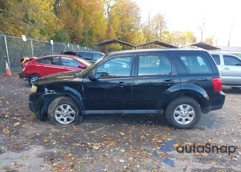 2010 Mazda Tribute I Sport из США, поврежденный, VIN 4F2CY0C70AKM00127